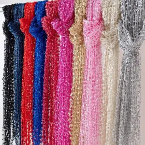 Detailed view of colorful sequin mesh scarves hanging together, showing sparkling metallic fabric.