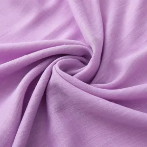 Close up detail of purple slub long scarf texture, soft breathable fabric shawl showcase.