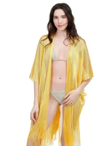 Metallic shimmering gold cardigan detail, featuring elegant fringe and lightweight sheer fabric.