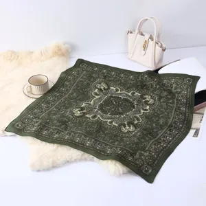 Vintage green patterned printed small square scarf, elegant neck accessory or hair band detail view.