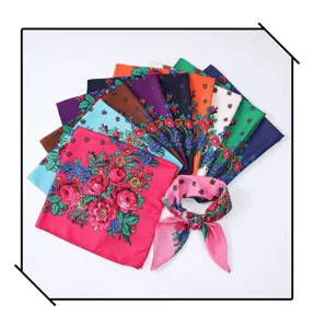 Detailed view of colorful retro floral printed square scarves, vintage style headscarf detail.