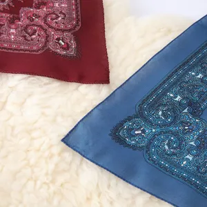 Retro printed square scarf detail showing delicate paisley patterns and soft texture for women.