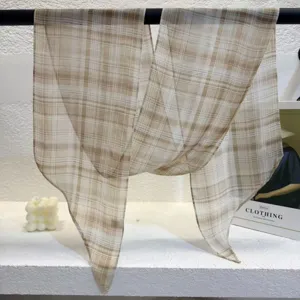 Elegant beige plaid long ribbon scarf for women, chic slanted design for versatile styling.