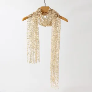 Gold sequin hollow-out fringe long scarf, elegant metallic mesh wrap shawl for women.