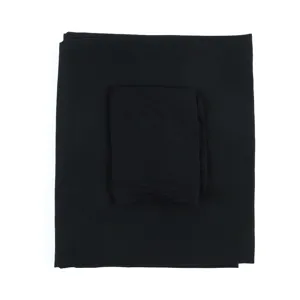 Black chiffon hijab set detail showcasing the folded scarf and matching inner underscarf.