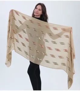 Elegant diamond patterned linen blend scarf with fringe detail, perfect chic shawl for women.