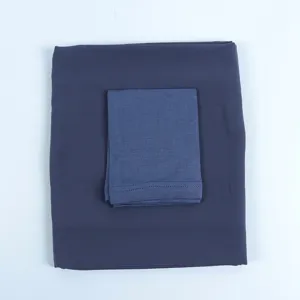 Detailed view of the dark blue mercerized cotton undercap and chiffon long hijab set.