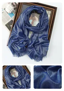 Close-up details of the shimmering metallic glitter long scarf, showing soft fabric texture.