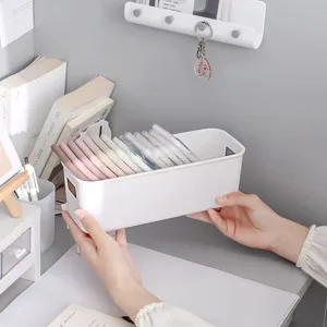 Caja de almacenamiento de escritorio blanca para organizar fundas de móviles
