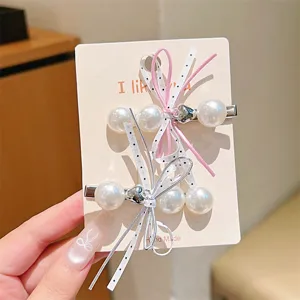 Zoete parel haarspelden met strikken, leuke haaraccessoires voor dagelijkse stijl van vrouwen.