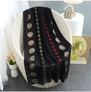 Fashionable black polka dot scarf with fringes, elegant cotton linen shawl for women detail view