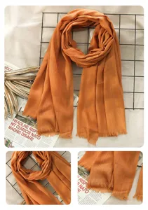 Detailed view of the autumn winter women solid color linen scarf with chic tassel fringe.