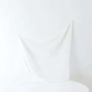 White pleated square scarf detail, lightweight fabric with fine pleats for women's daily wear.