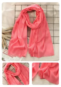 Pink cotton linen scarf for women, solid color winter shawl with elegant fringe design.