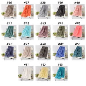 Solid color linen scarf variant color chart showing multiple shades with tassels for winter