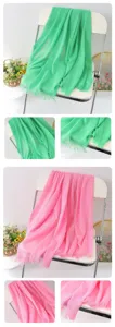 Solid color linen scarf and shawl detail view, featuring elegant tassel design and soft texture.