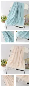 Solid color linen scarf detail view, showing soft texture and delicate tassel edge design.