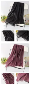 Detailed view of solid color linen scarf featuring soft tassel edges and natural fabric texture.