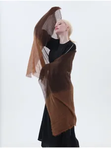 Close-up detail of the lightweight gradient linen scarf draped gracefully over the shoulder.