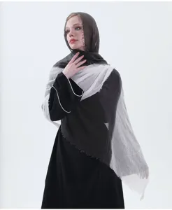 Detail shot of gradient cotton linen scarf women shawl wrap hijab showing soft draped texture.