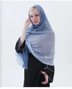 Detail view of the gradient cotton linen scarf, stylish women hijab and gauze wrap.