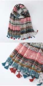 Detailed view of bohemian colorful printed tassel scarf, soft fabric texture and fringe.