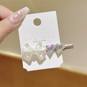 Koreaanse stijl iriserende hart strik haarspeld detail, schattige eendebek clip accessoire.