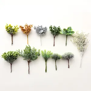Artificial Christmas pine needles and PE eucalyptus leaf branches for DIY wreaths and tree decor