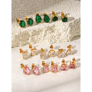 Detailed view of trendy 18k gold plated titanium steel cubic zirconia stud earrings set.