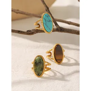 Vintage stainless steel natural stone ring with adjustable open band and unique design details.