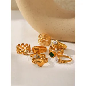 Gold stainless steel rings set detail shot showcasing unique trendy fashion jewelry styles.