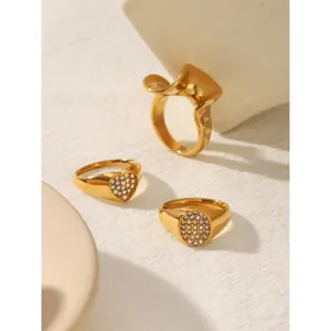 Chic gold-plated stainless steel geometric rings set featuring sparkling paved cubic zirconia.