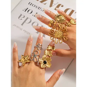 Stainless steel butterfly rings set, trendy gold flower and star stackable rings for women.