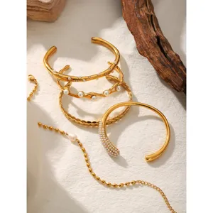 French vintage gold stainless steel pearl cuff bracelet set detail showcasing elegant designs.
