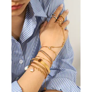 Multi-layer stainless steel bracelet set with shimmering zircon and heart pendant for women.
