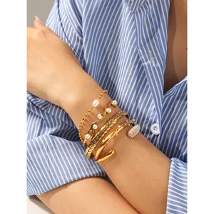 French retro pearl stainless steel bracelet set, elegant stacked gold metal bangles for women.