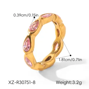 Gold titanium steel ring featuring sparkling pink pear-cut cubic zirconia stones for women.
