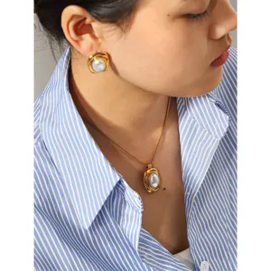 Fashion 18K gold plated titanium steel necklace and earrings set with elegant design.