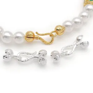 Copper gold plated silver pepper clasp DIY jewelry accessory detail for handmade necklaces.