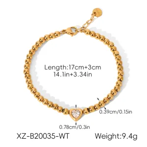 Bracciale in acciaio dorato con zircone a cuore, gioiello elegante minimalista per donne.