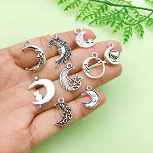 Detail van antiek zilveren legering ster maan bedels set voor DIY sieraden maken accessoires