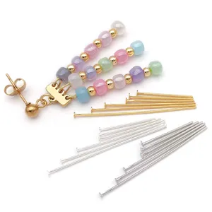 Detailed view of 18k gold plated t-pin headpins and colorful bead charms for diy jewelry.