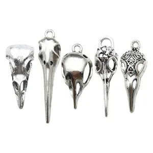 Vintage silver bird skull charms pendant set for DIY jewelry making, Halloween gothic style.