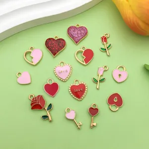 Close-up detail of colorful enamel heart and rose alloy charms for DIY jewelry making accessories.
