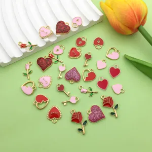 Enamel heart rose key charm set for DIY jewelry making detail view showing alloy pendant parts.