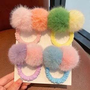 Fluffy pom-pom hair ties detail, colorful plush hair scrunchies for cute girls daily wear.