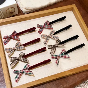 Sweet plaid ribbon bow hair clips for women, cute preppy style hair accessories and hairpins.