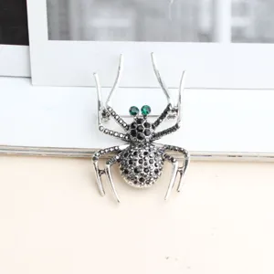 Élégante broche araignée en strass noirs épingle alliage cristal animal bijoux mode accessoire.
