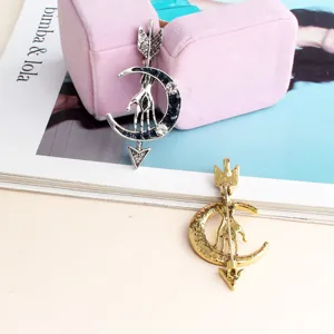 Vintage eye moon arrow rhinestone brooch pin for women fashion accessories clothing decor.