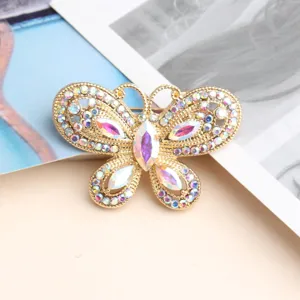 Exquisite rhinestone butterfly nail art accessory detail shot, featuring colorful sparkling crystal stones.